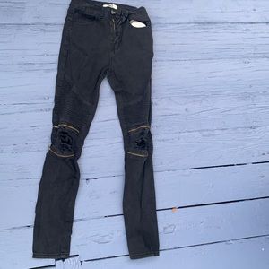 gold zippers on knees do zip but lead nowhere